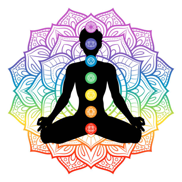 Seven chakras on meditating yogi man silhouette, vector illustration Seven chakras on meditating yogi man silhouette, vector illustration chakra illustrations stock illustrations