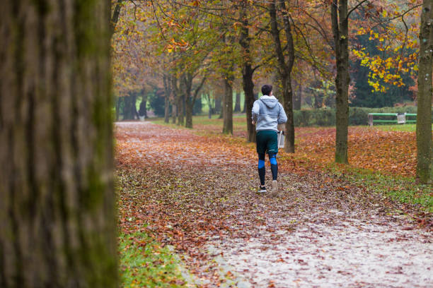istock Autumn run in the park 1177171056