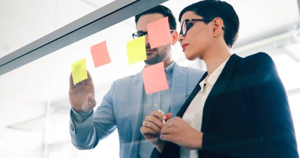 istock Group of business people collaborating in office 1177171272