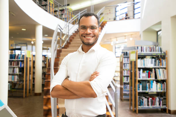istock Smiling African American man posing at public library 1177172333