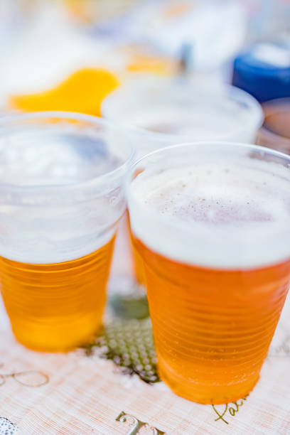 istock Beer glasses on a picnic table in the backyard. 1177174789
