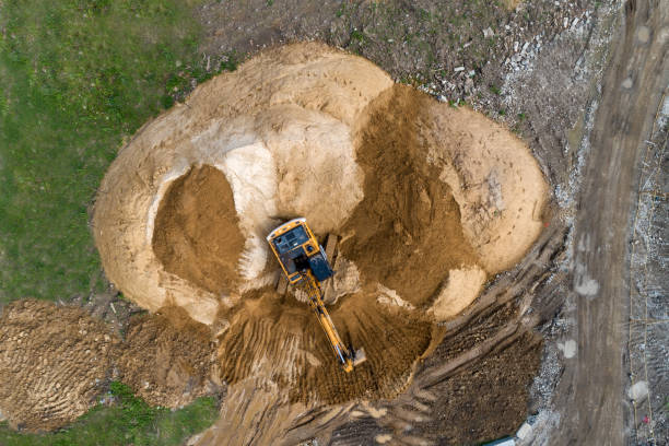 istock Crawler excavator builds a mound of soil. 1177175810