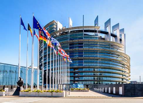 Strasbourg, France - September 13, 2019: Entrance of the Louise Weiss building, inaugurated in 1999, the official seat of the European Parliament which houses the hemicycle for plenary sessions.