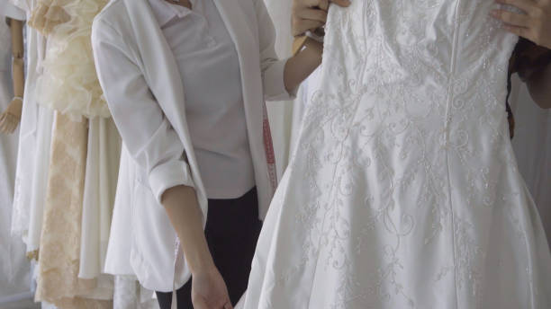istock Future bride customer talking with wedding store shopkeeper 1177176271