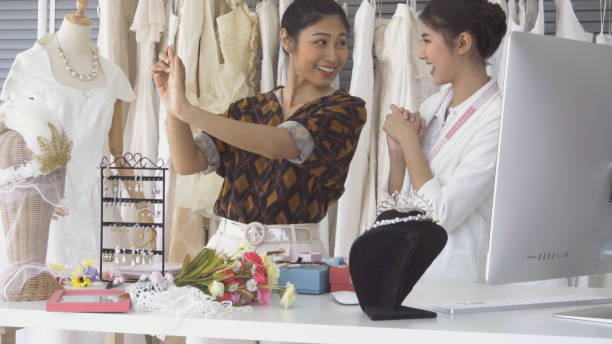 istock Future bride customer talking with wedding store shopkeeper 1177176316