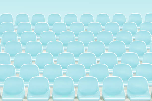 Light  blue rows of seats on the stadium .