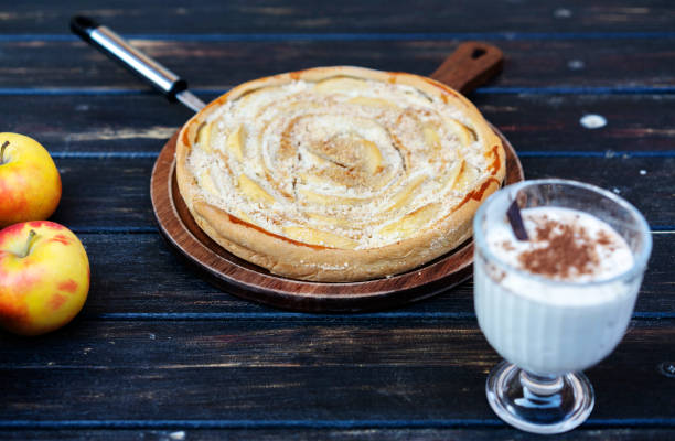 Slice of dry and crumbly cake with cracked crust on top, served in dessert plate on restaurant table