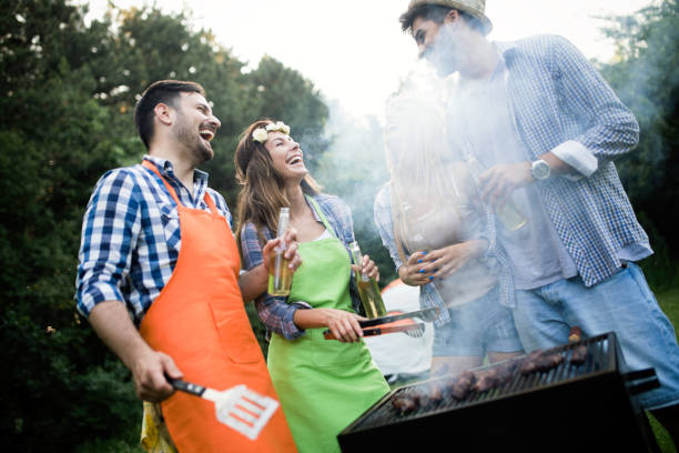 istock Friends having a barbecue party in nature 1177176487