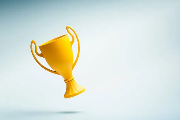 Photo of Winner cup isolated on neutral background