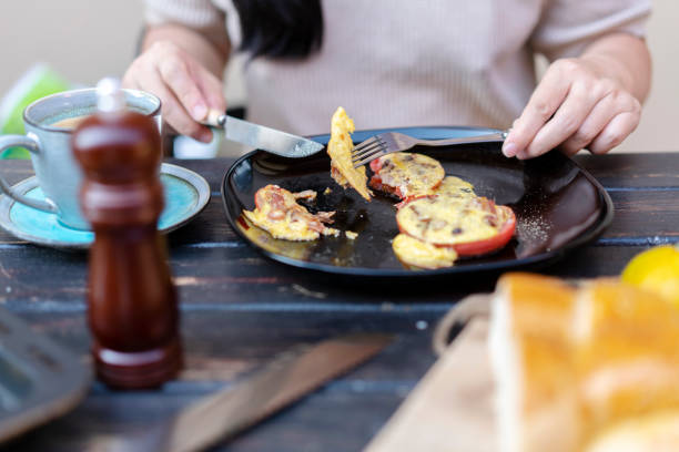 istock homemade healthy breakfast: baked tomato slice with egg and bacon 1177185746