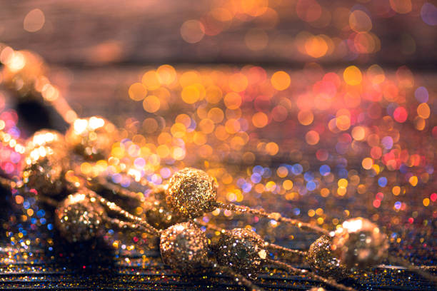 istock Shiny Christmas decorations on glitter background 1177187260