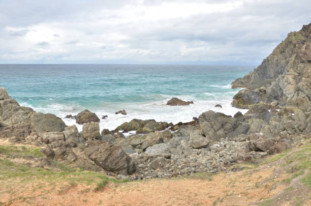 istock Scenery of pacific ocean with rocks 1177188072