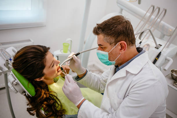 istock Young woman at dentist's office replacing fillings 1177188817