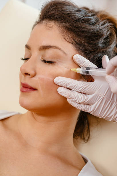istock Woman receiving botox injection 1177190609