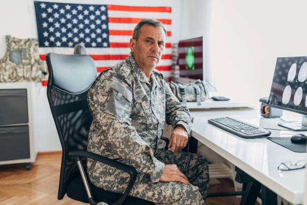 istock Mature man American soldier in office 1177192493