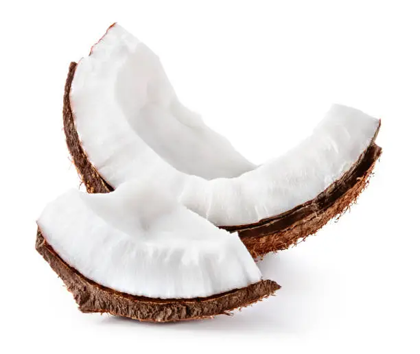 Photo of Coconut slice. Coco pieces isolated on white background.