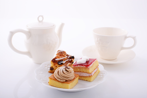 A cup of tea with sweets