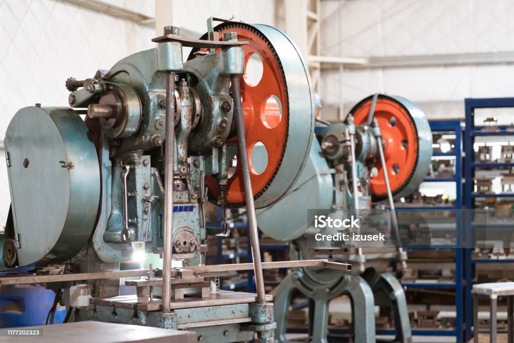 Yoke machine in metal factory Close-up of yoke machine. Manufacturing machinery is in factory. Absence Stock Photo