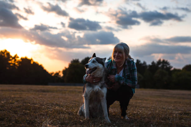 Mature woman with her loving dog