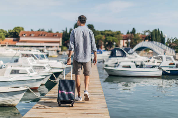 istock Tourist walking on pier 1177210310