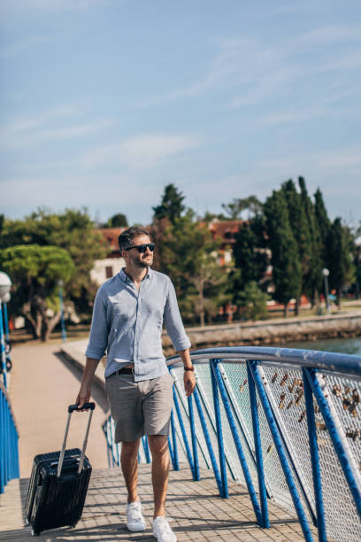 istock Tourist with luggage 1177210381