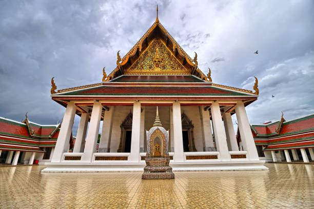 Wat Saket temple in Bangkok with dramatic sky