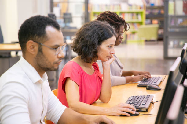 istock Stressed adult female student taking exam 1177215828
