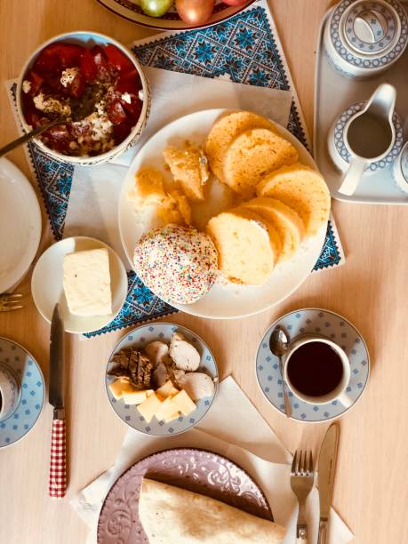 istock Homemade holidays breakfast. Top view. Easter bread. Tea. Salad. 1177216743