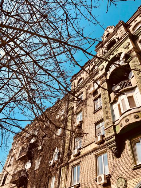 istock beautiful old house, trees and blue sky 1177216764