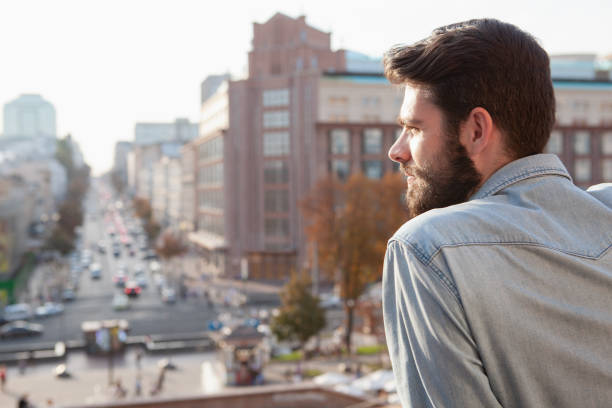 istock Handsome bearded man sightseeing at the city 1177218273