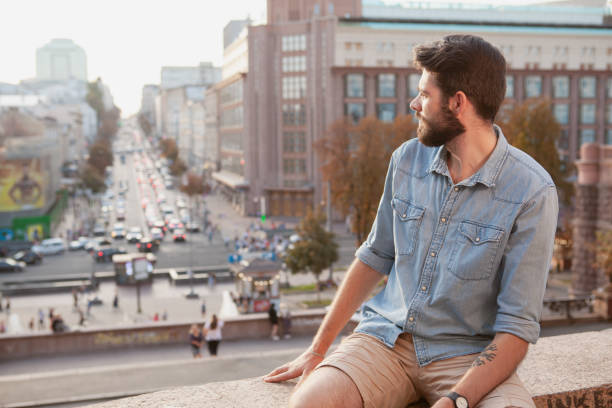 istock Handsome bearded man sightseeing at the city 1177218364