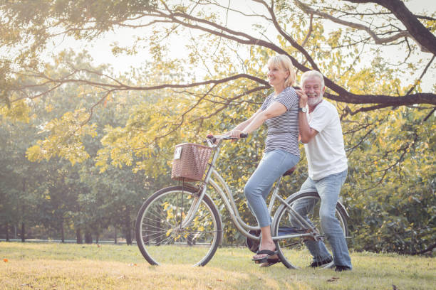 istock Couples elderly are bicycling together. 1177222536