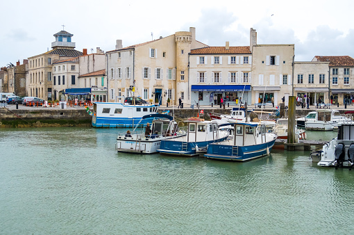 St Martin De Re, France - May 09, 2019: Fishing boats in the harbour of Saint Martin de Re on Ile de Re island in France