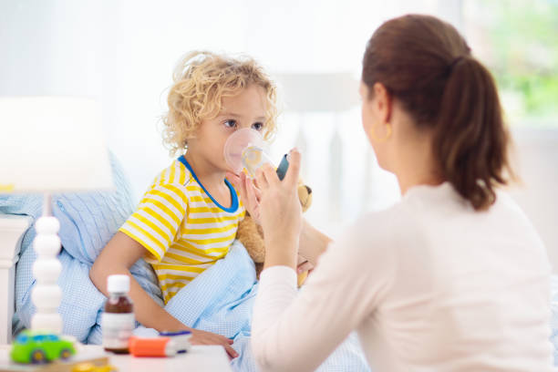 istock Sick little boy with asthma medicine. Ill child. 1177223985
