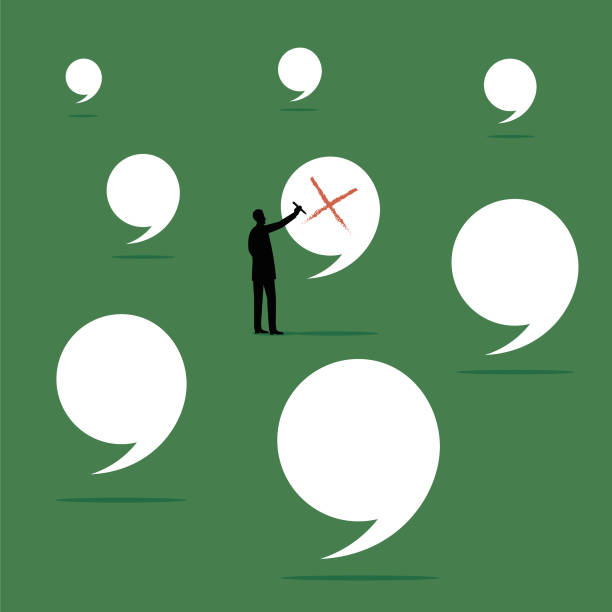 istock Illustration of a person drawing a red cross on a speech bubble 1177224586