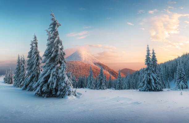 istock Fantastic orange sunset in snowy mountains 1177224910