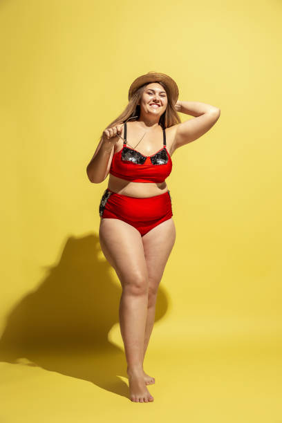istock Young caucasian plus size female model's preparing for beach resort 1177225269