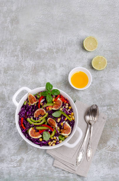 istock Salad of raw vegetables with figs 1177225294
