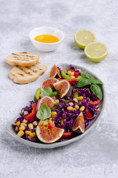 istock Salad of raw vegetables with figs 1177225370