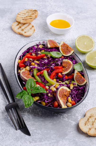 istock Salad of raw vegetables with figs 1177225421