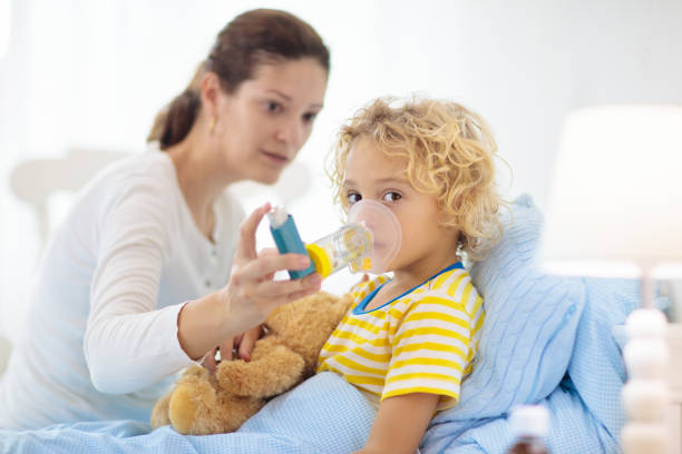 istock Sick little boy with asthma medicine. Ill child. 1177226119