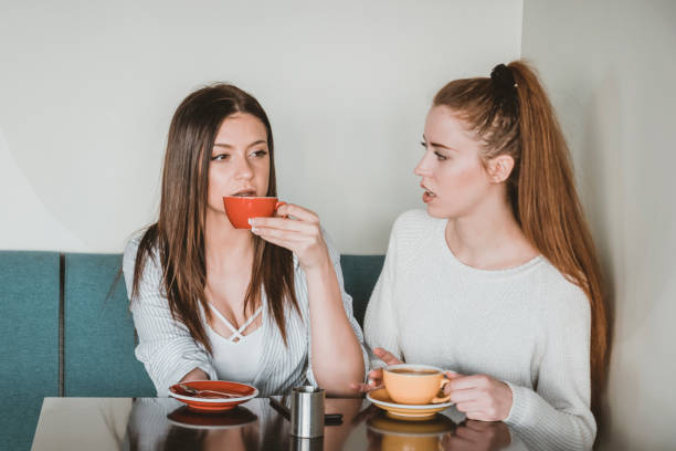 istock Young Female Friends is Having a Coffee Break 1177226145