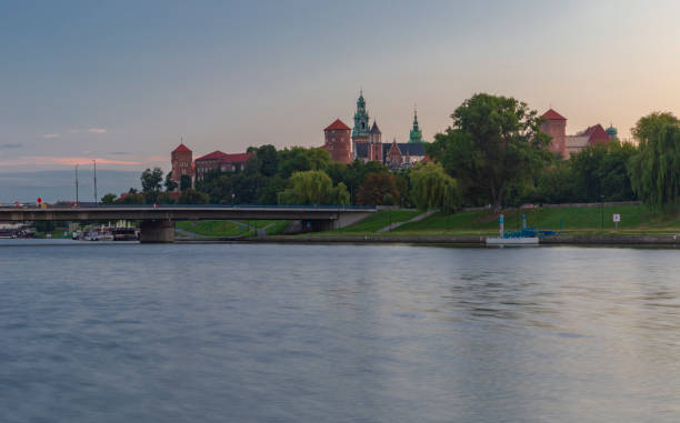 istock Wawel castle at sunrise reflected in the Vistula river 1177226903