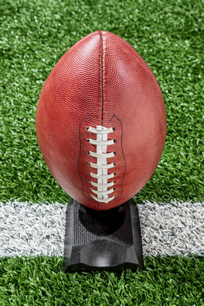 istock Professional American Football on kicking tee 1177227863
