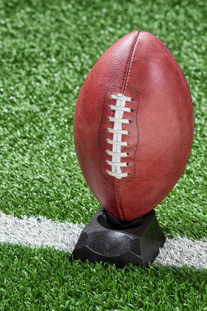 istock Professional American Football on kicking tee 1177228090