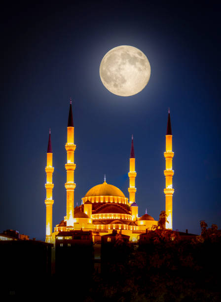 Kocatepe Mosque at night under full moon, Ankara, Turkey. Kocatepe Mosque at night under full moon, Ankara, Turkey. camii stock pictures, royalty-free photos & images