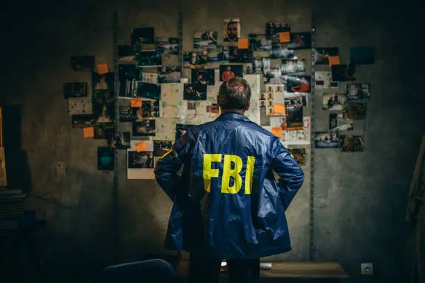 Photo of Mature FBI agent works on a case alone