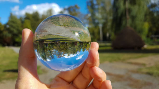 istock Glimpse through the glass ball - way trough a park in summer 1177231490
