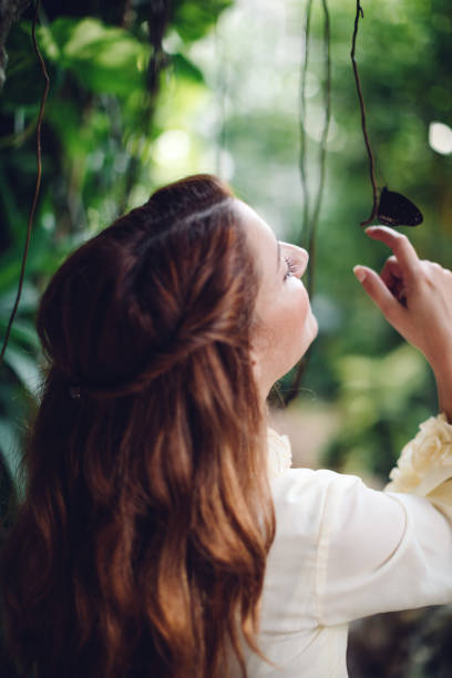 Young woman with butterfly