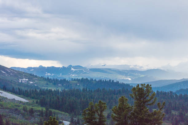 Very beautiful mountain scenery. Panoramic view from a mountain pass in Siberia. Very beautiful view from the mountain pass.